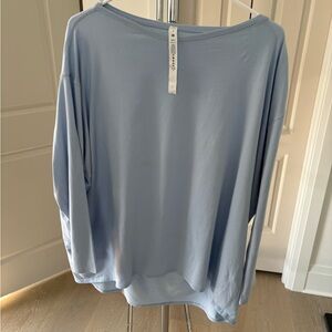 Lululemon Back In Action Powder Blue, long sleeve shirt. Size 16.